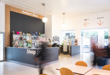 Shop and seating area at the Herbert Art Gallery, designed by Retail Experience Design