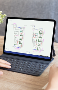 Floorplan designs of an office interior shown on a laptop